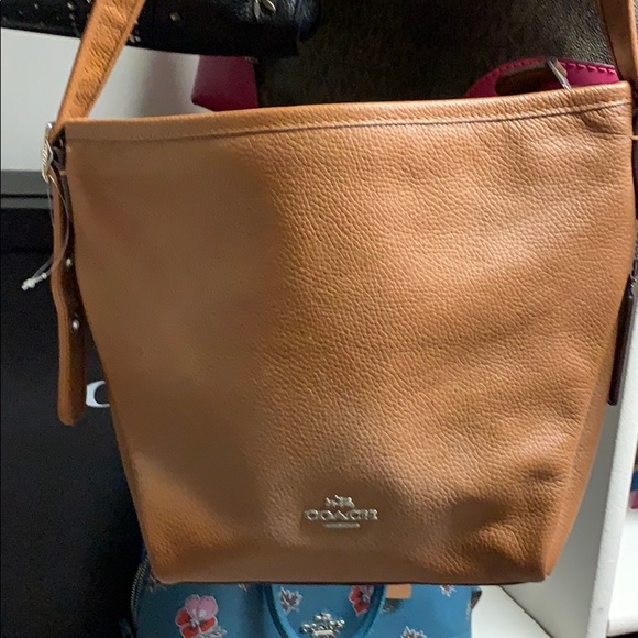 Coach Handbags - Never used it and I was thinking someone could.